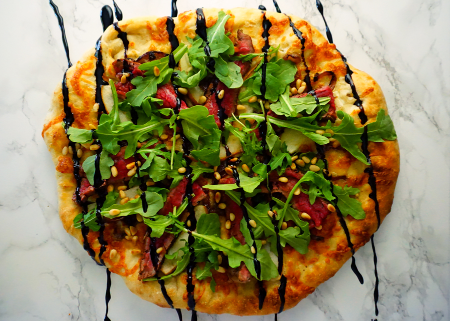 Flank Steak Pizza with pear, boursin cheese, arugala and balsamic glaze