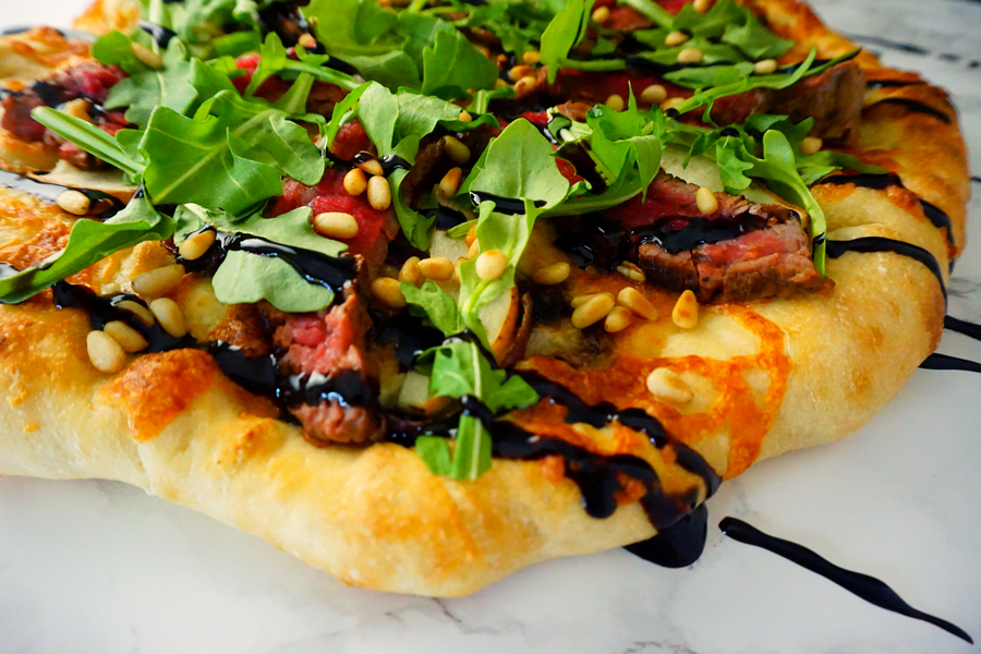 Flank Steak Pizza with pear, boursin cheese, arugala and balsamic glaze