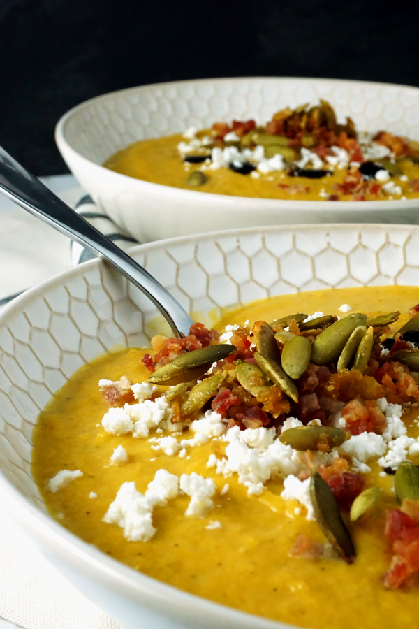 creamy butternut squash pumpkin soup with apples, pancetta and goat cheese