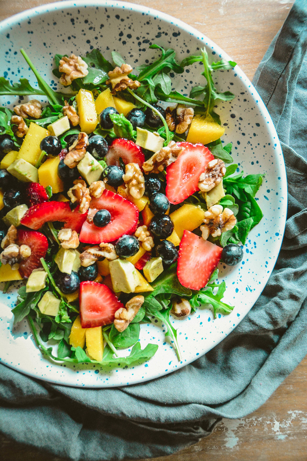 arugula and strawberry salad with cayenne lemon vinaigrette by Calm Eats