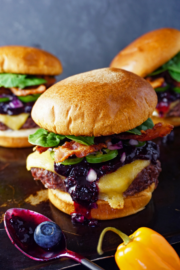 Habanero-lime blueberry compote tops three juicy bacon cheeseburgers | Frydae