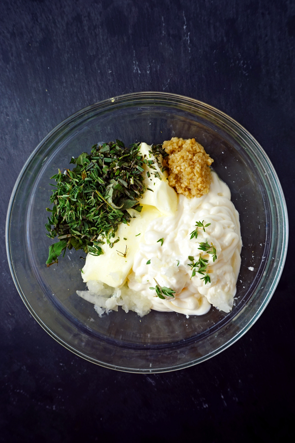 mayonnaise butter herbs and lemon zest in a bowl