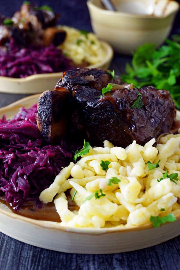 close-up image of german sauerbraten made with short ribs